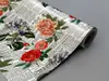 Autocolant blat masă, model ziar cu flori multicolor, 100 x 100 cm, racletă inclusă