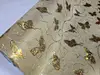 Autocolant bej glitter cu fluturi aurii, rolă de 90x200 cm