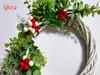 Coroniţă din nuiele albă decorată cu plante artificiale verzi şi stamine roşii, 20 cm