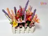 Decoraţiune cu flori artificiale pastel în cutie din lemn alb