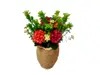Ghiveci din ceramică cu flori artificiale, garofiţe şi plante verzi