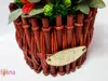 Coş din lemn maro roşiatic, cu flori artifciale roşii, 30 cm