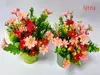 Set 2 ghivece verzi cu flori artificiale roz, 25 cm înălţime