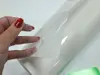 Folie auto TPH pentru protecție caroserie, transparentă cu aspect lucios, rolă de 75x100 cm + racletă TPU