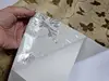 Autocolant bej glitter cu fluturi aurii, rolă de 90x200 cm