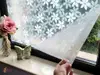 Folie geam autoadezivă, Folina Tina, sablare cu imprimeu flori albe, 90 cm latime
