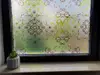 Folie geam autoadezivă Lara, sablare cu imprimeu verde si maro, lățime 100 cm