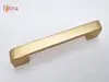 Mâner mobilă metalic auriu cu finisaj mat, 128 mm distanţa dintre punctele de fixare