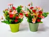 Set 2 ghivece verzi cu flori artificiale roz, 25 cm înălţime