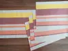 Set Napron şi 4 Placemats din PVC, cu dungi portocalii