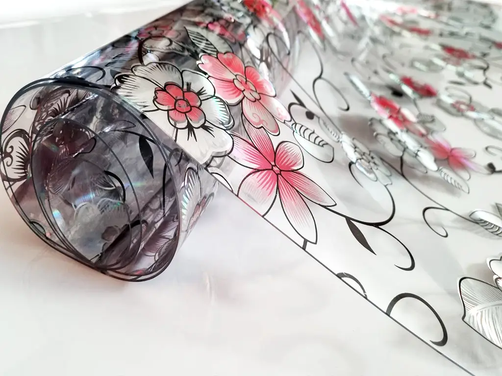 Folie protecţie blat mobilă, transparentă cu model floral colorat, fără adeziv, 1.2 mm grosime, 100x200 cm