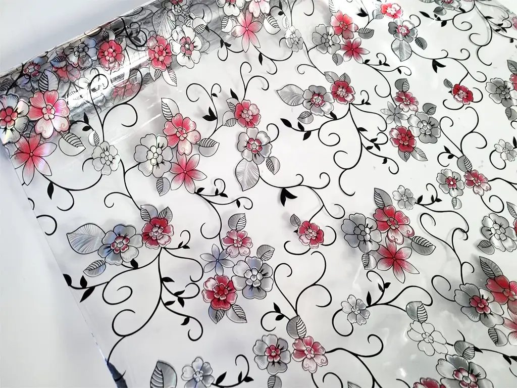Folie protecţie blat mobilă, transparentă cu model floral colorat, fără adeziv, 1.2 mm grosime, 100x200 cm