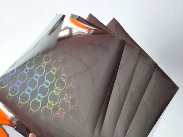 set craft cu 5 coli a4 folie holograma argintie cercuri