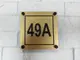 Placuta-numar-casa-din-bond-auriu-personalizata-cu-4-distantiere-incluse-gravat-simulare-1-3379