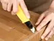 cutter-deli-dl003a-cu-lama-sk5-si-buton-de-blocare-rotativ-s03-2878