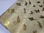 Autocolant bej glitter cu fluturi aurii, rolă de 90x200 cm