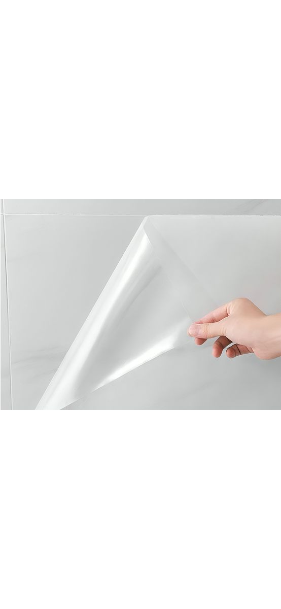 Folie de protecție autoadezivă pentru perete, transparentă și rezistentă la căldură, aspect lucios, rolă 61x100 cm, racletă inclusă