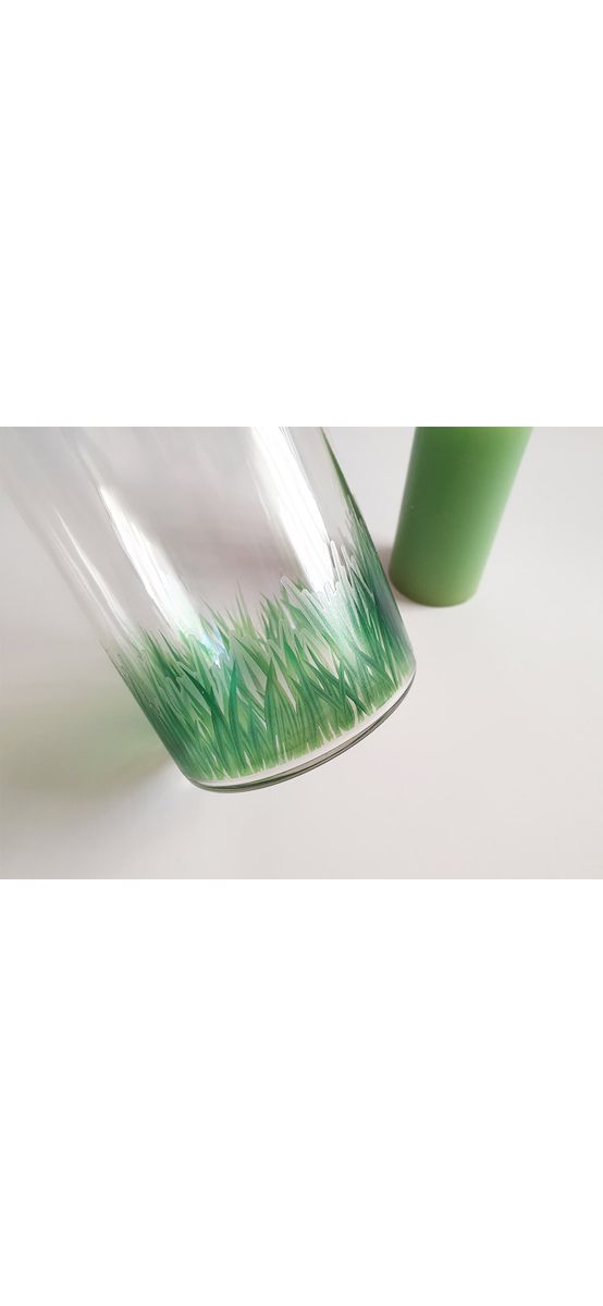 Cilindru din sticlă cu lumânare verde
